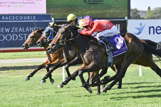 Firm Agreement flashes down the outside to claim victory.